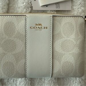 Coach Cream and Gold Wristlet Clutch